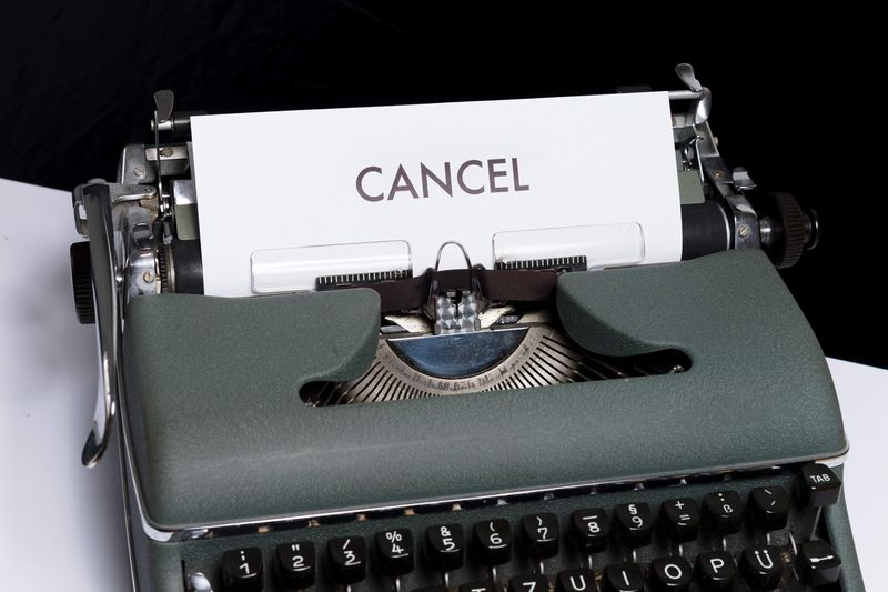 What is the difference between cancellation and churn?